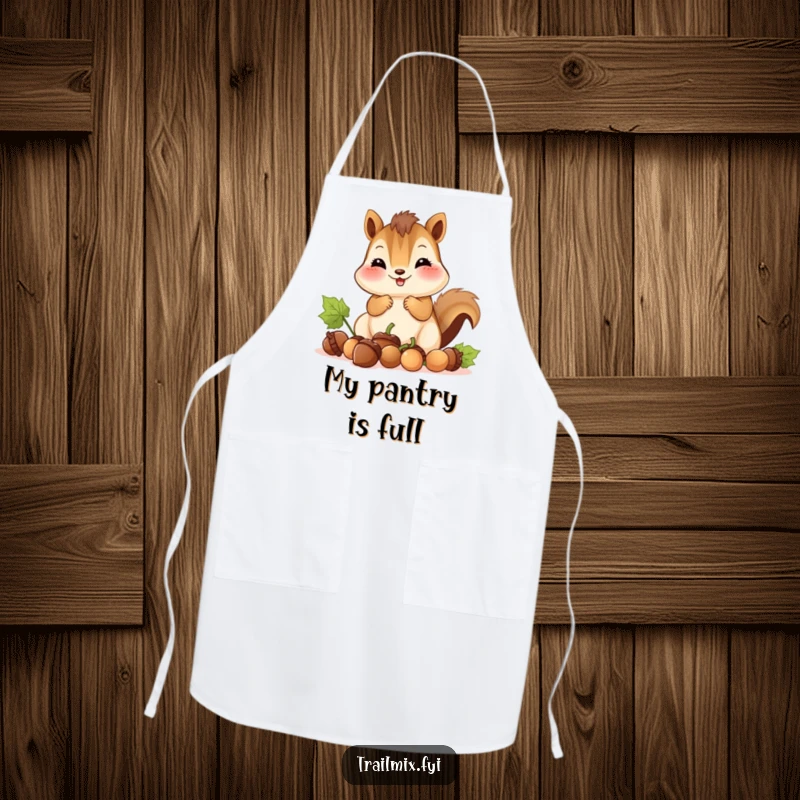Funny apron depicts a smiling chipmunk with packed cheeks gathering acorns, ideal for kitchen fun and humorous wear.