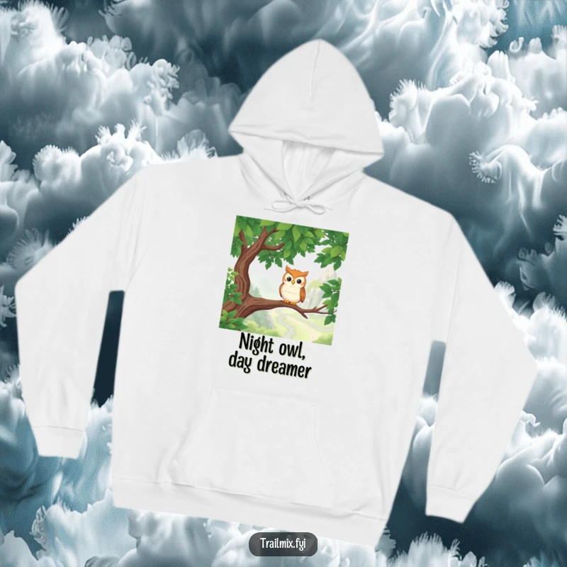 Funny Owl Hoodie: A smiling owl character perches on a branch, enjoying a breathtaking view of a hiking trail, warm and inviting.