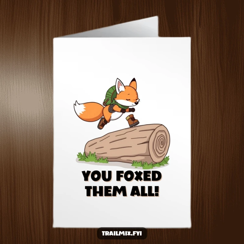 Funny Free Printable Congratulations Card: Playful fox wearing hiking boots gracefully leaps over a fallen log, celebrating.