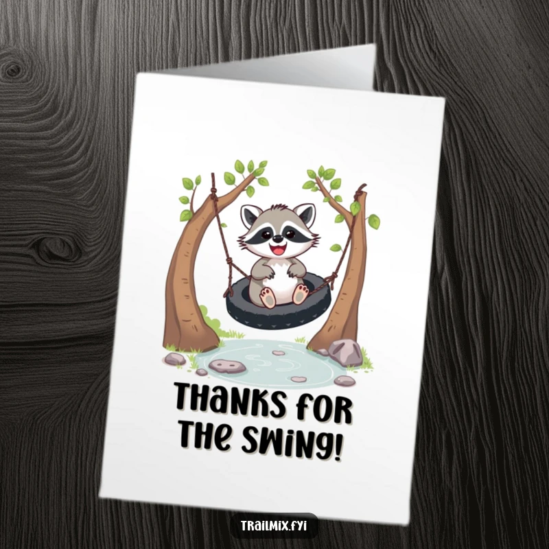 Funny free printable thank you card of a beaming raccoon swinging high on a tire over a babbling brook, showing appreciation.