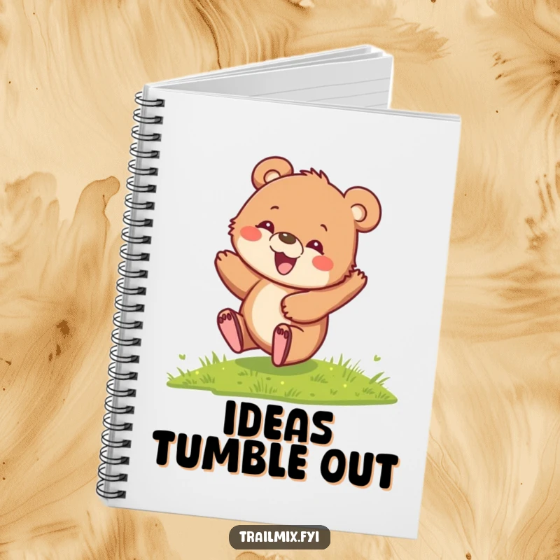 Funny Bear Cub Notebook with a delighted cub rolling down a hill, ideal for jotting down notes, ideas, and playful thoughts.
